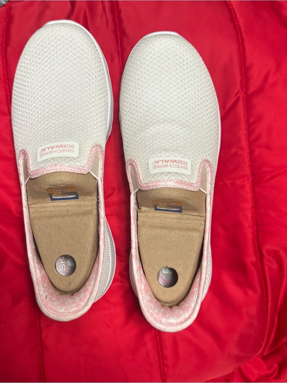 Skechers Womens Slip-On Sneakers in White and Light Pink